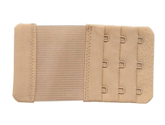 Beige bra strap extender on a white background