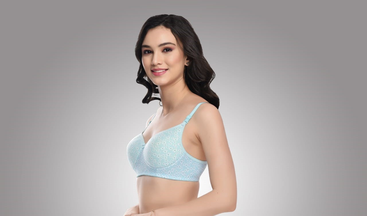 Liamoure Full Coverage Printed Padded Bra in light blue with white floral print, offering stylish and comfortable support for everyday wear.
