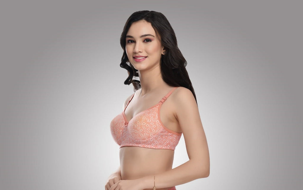 Liamoure Full Coverage Printed Padded Bra in light red with white floral print, offering stylish and comfortable support for everyday wear.