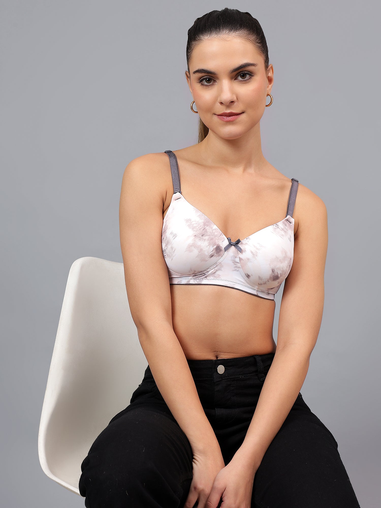 Model wearing Liamoure Lightly Padded Bra with a stylish marble light stoned pattern, designed for everyday comfort and support.