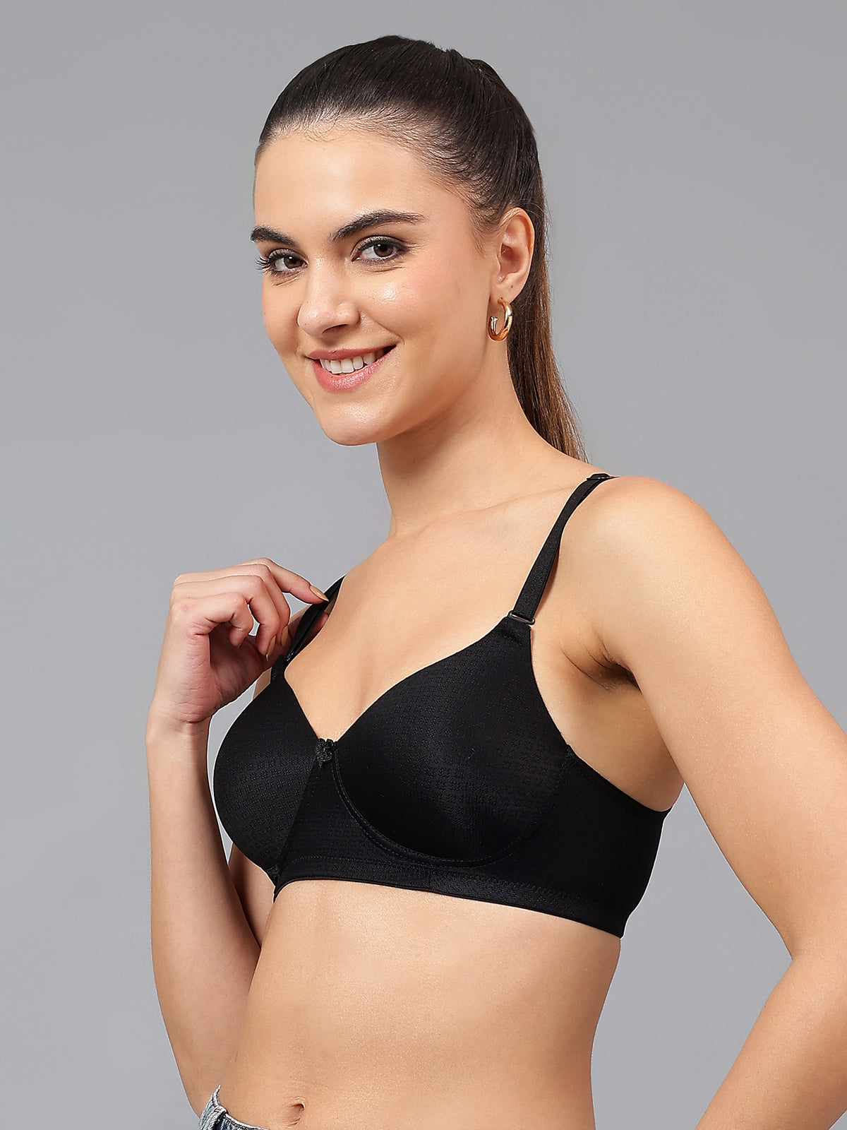Side view of Liamoure Black T-Shirt Bra showcasing its padded, non-wired design with soft fabric for ultimate comfort and support.