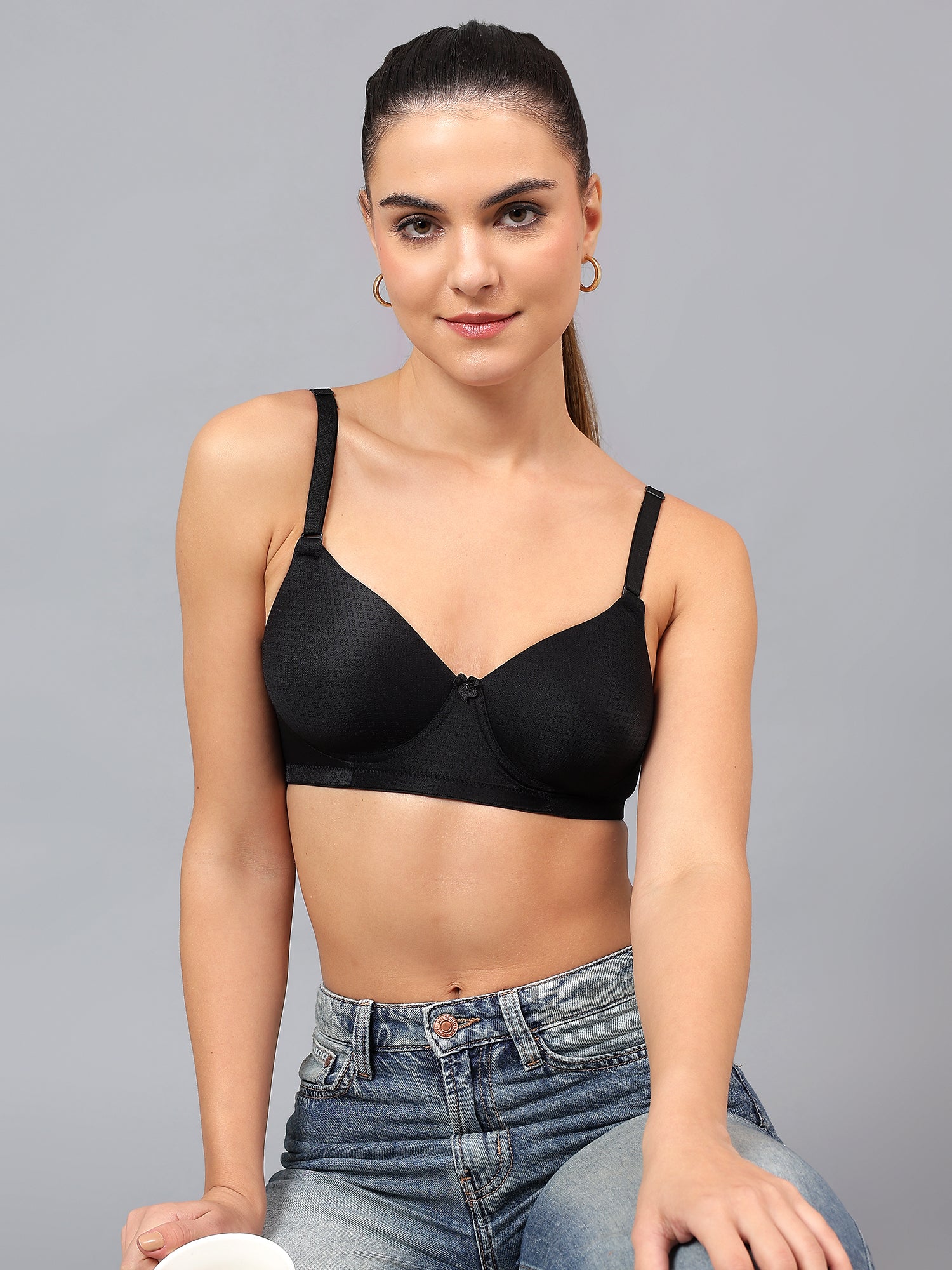 Liamoure Black T-Shirt Bra featuring a smooth, seamless finish with full coverage and convertible straps for a perfect fit.