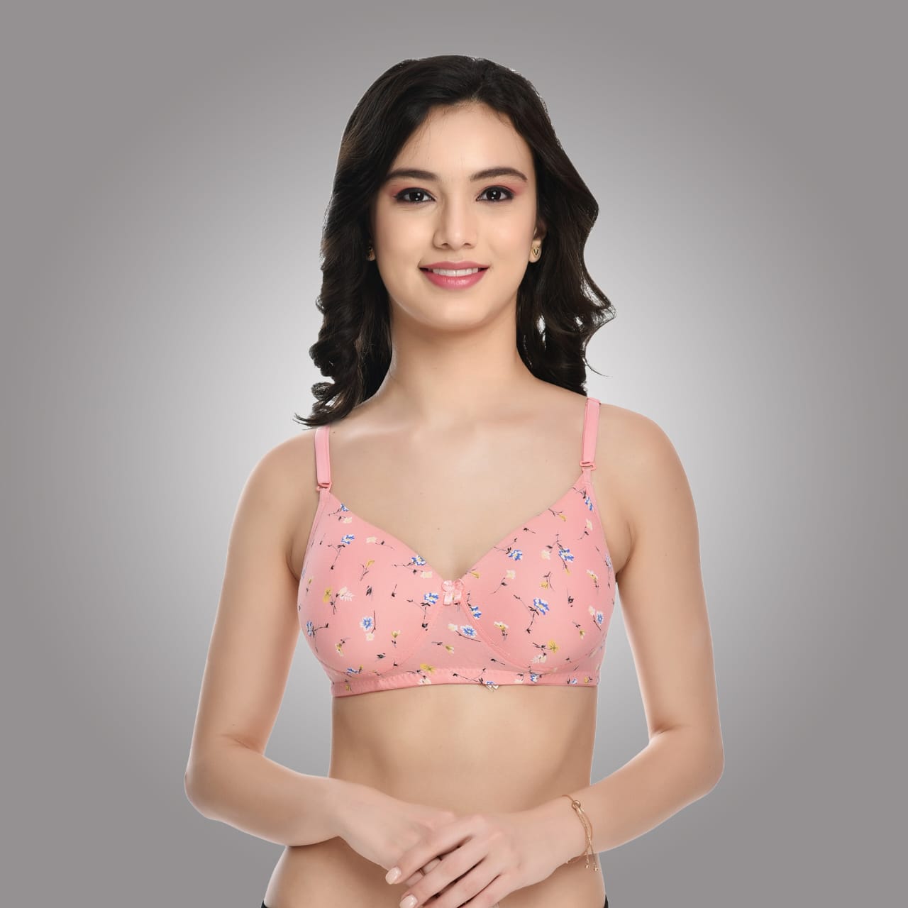 Liamoure pink floral printed bra with adjustable straps and soft padded cups, ideal for everyday comfort and support.