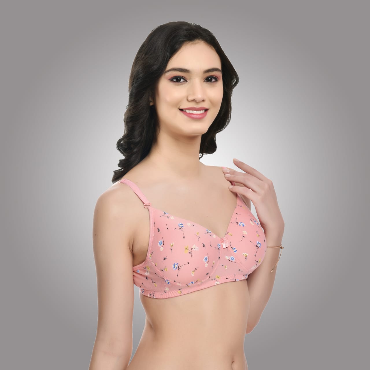 Side view of Liamoure pink floral printed bra showing seamless fit and non-wired padded design for stylish comfort wear.