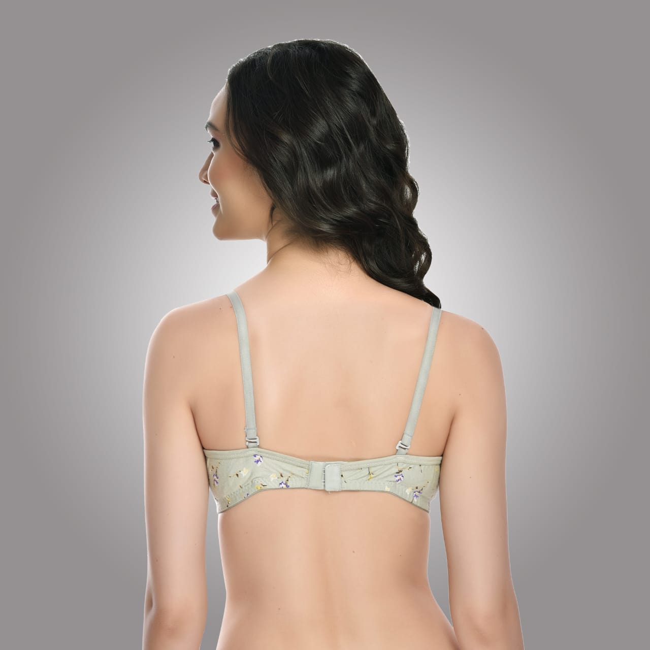 Back view of Liamoure green floral printed bra with double hook closure and stretchable straps for a perfect fit.