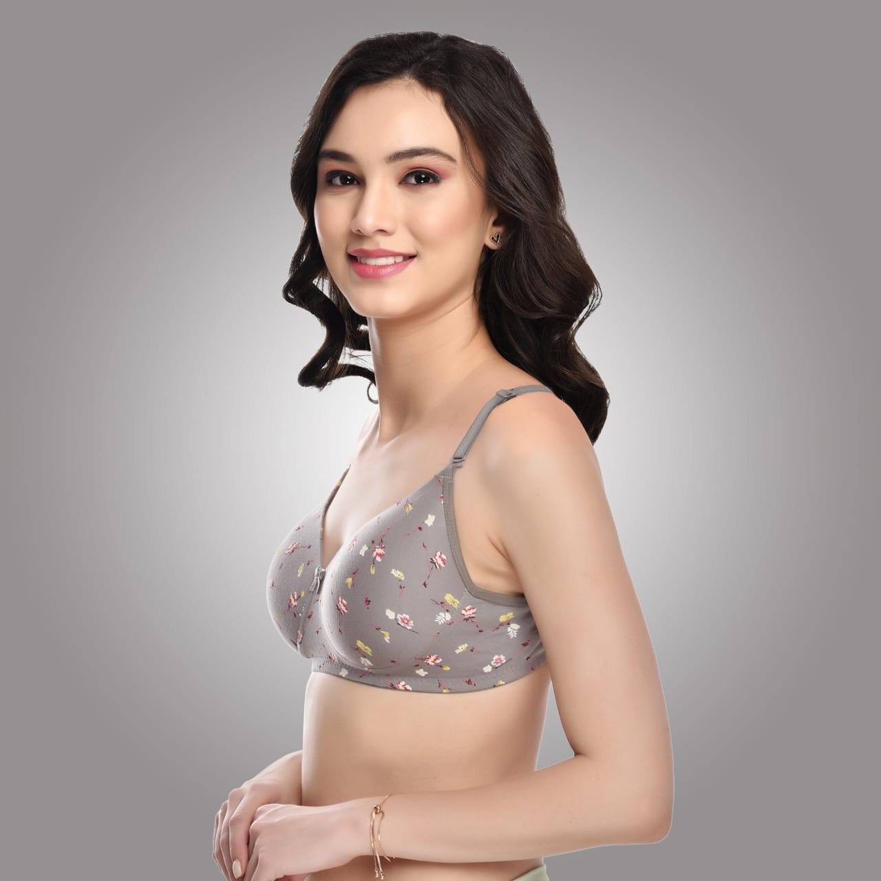 Angled side view of Liamoure grey floral printed bra showing seamless padded cups and adjustable straps for comfort wear.